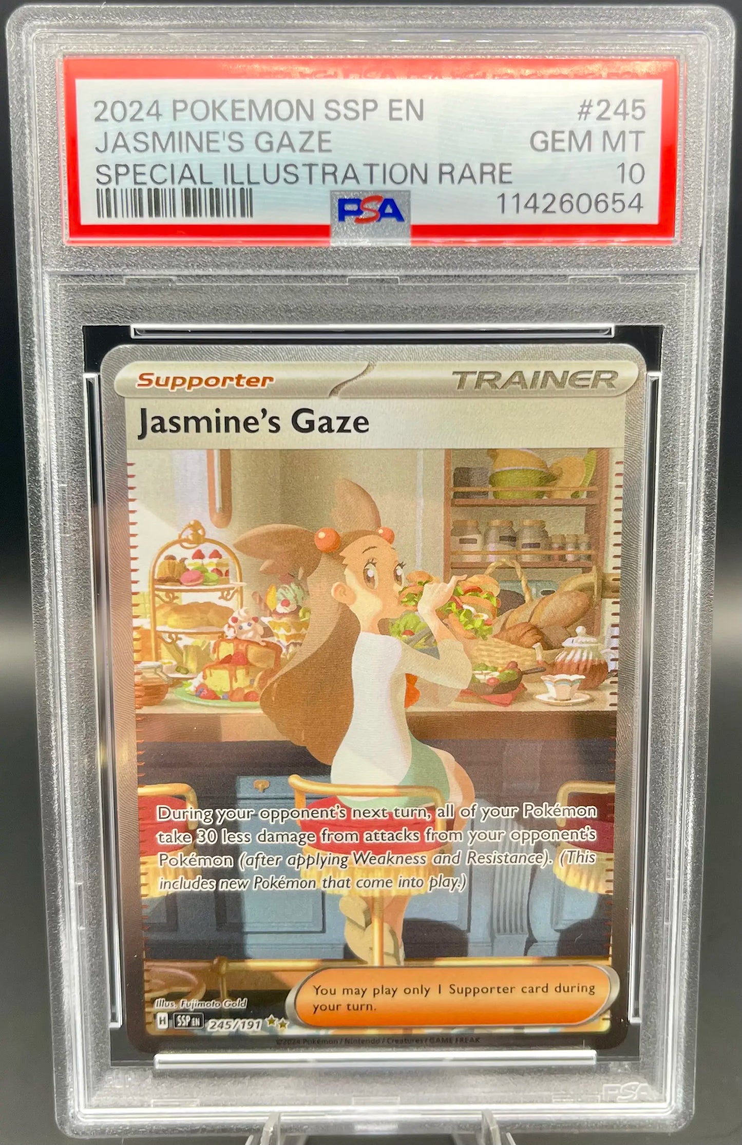 Pokémon trading card in a protective case with PSA grading label