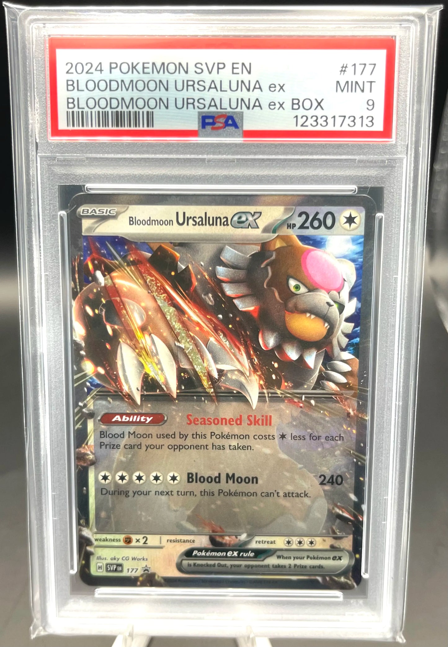 Pokémon trading card featuring Bloodmoon Urasaluna EX in a protective case with PSA certification label.