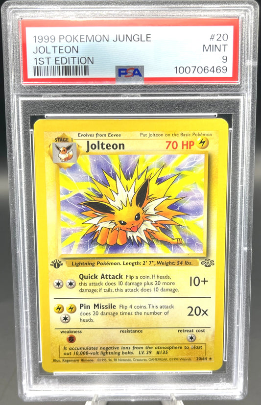 1999 Pokémon Jungle Jolteon trading card in a protective case with PSA grading label.